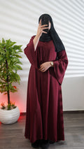 Abaya rose pour les grandes occasions, alliant luxe, élégance et raffinement.